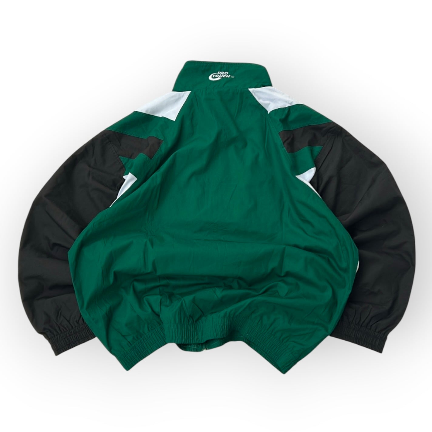 Green x black shell jacket