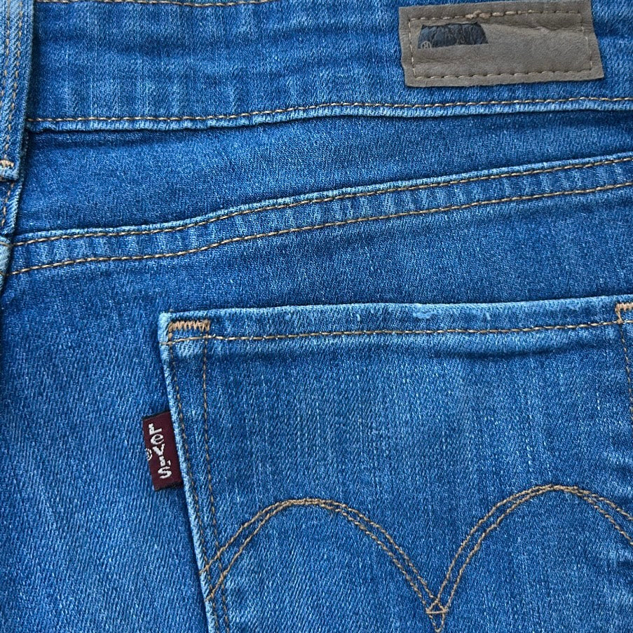 Levis Mid wash denim booty shorts