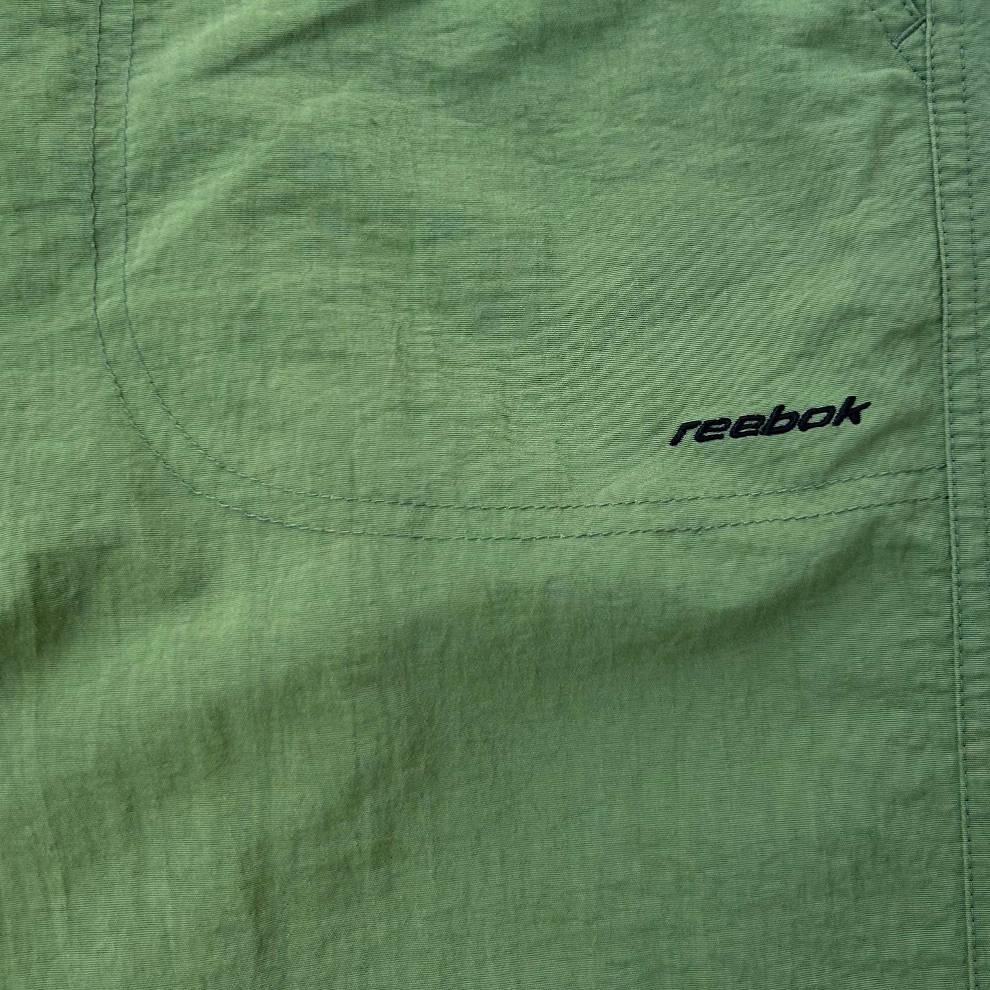 Reebok green bermuda shorts