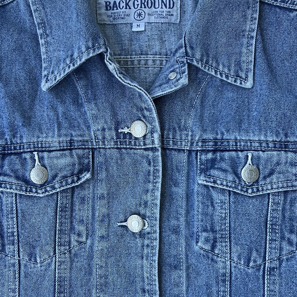 Back ground vintage light wash vest denim jacket
