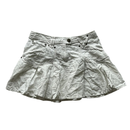 white pleated mini skirt with corset like adjustable detail on the back