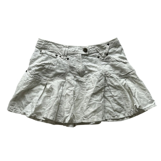 white pleated mini skirt with corset like adjustable detail on the back