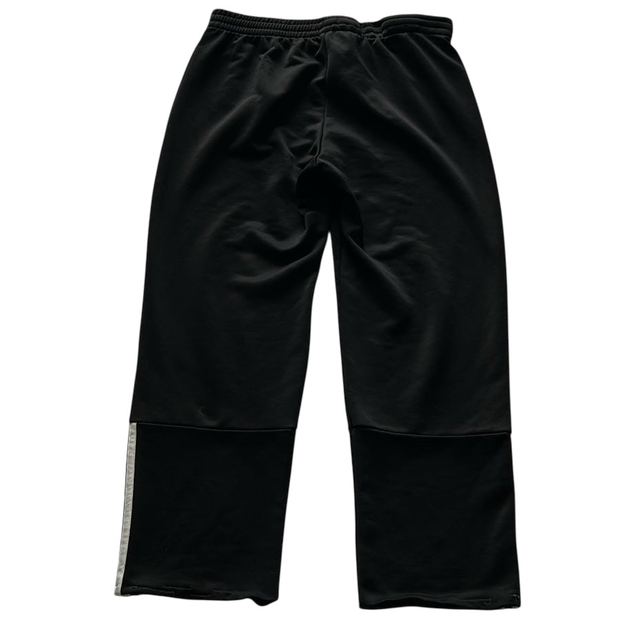 Adidas track oants half stripe